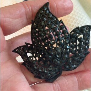 Black stone metal brooch